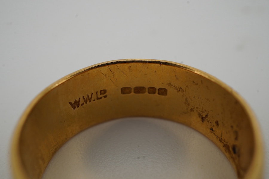 A 22ct gold wedding band, circa 1972, the 7.5mm band of plain design, size N1/2, British hallmarks, sponsor's mark WWLd, gross weight 7 grams
